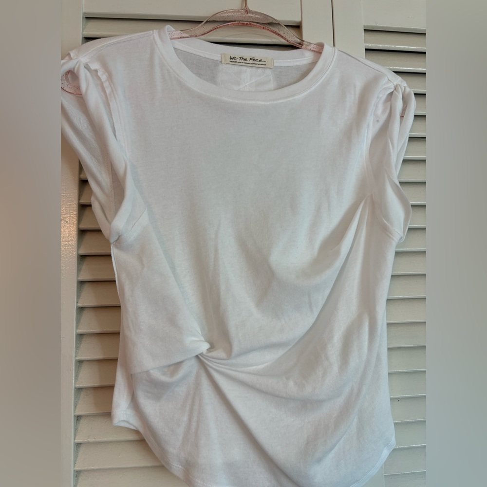 Free people White active top in size small. Size S